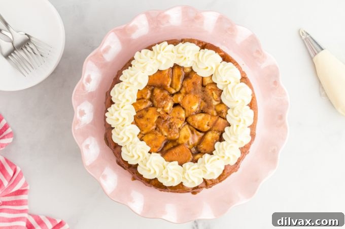 A finished cinnamon cake on a cake plate (top view).