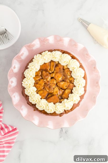 Top view of cinnamon roll with frosting.