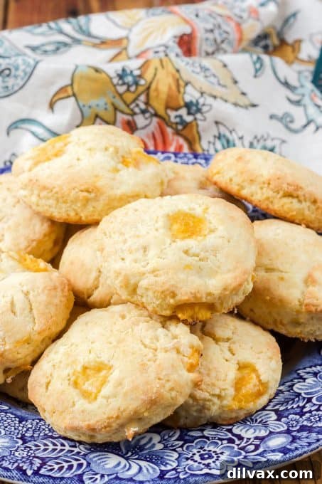Sun-Kissed Peach Scones 3 Peach Scones on a plate.