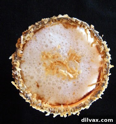 The finished Toasted Coconut Almond Shake garnished with coconut