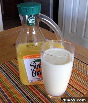 Close-up of a vibrant Orange Dream Smoothie in a glass, ready to be enjoyed.