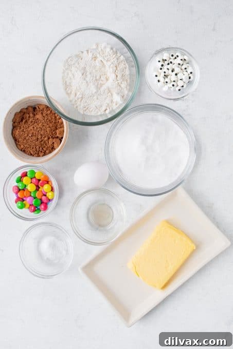Ingredients for Easy Halloween Monster Cookies laid out on a table.