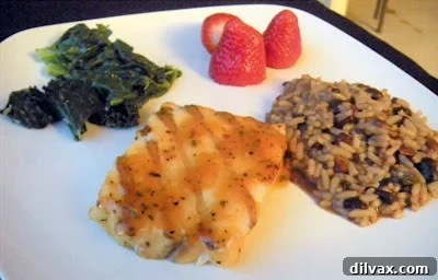 A serving of Classic Grilled Tilapia on a white plate