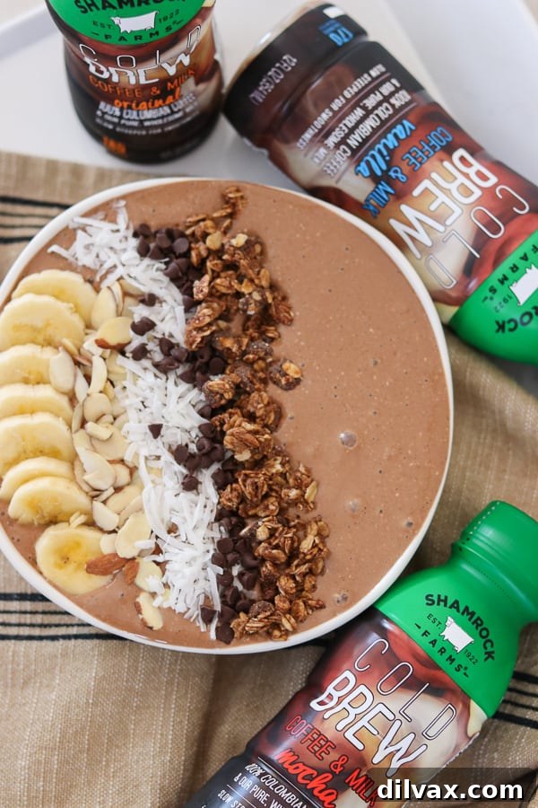 Shamrock Farms Cold Brew Coffee & Milk make this Banana Mocha Smoothie Bowl a great way to start your day! A beautifully presented smoothie bowl topped with chocolate shavings and banana slices.