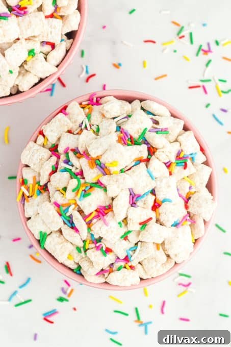 Simple Funfetti Snack Mix 3 Funfetti Puppy Chow in a white bowl, ready to serve.