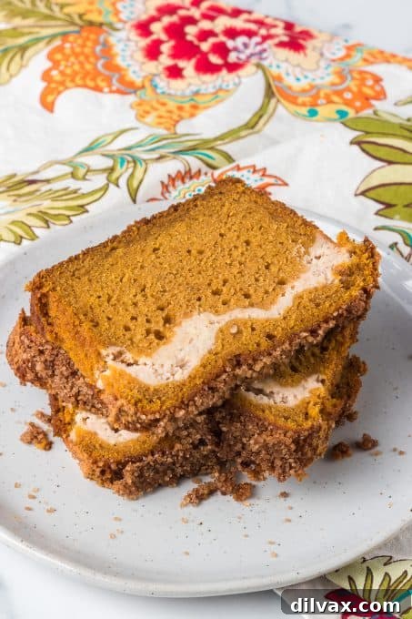 Pumpkin Cheesecake Bread 9 A stunning top-down view of a full loaf of Pumpkin Cream Cheese Bread with a perfect swirl.