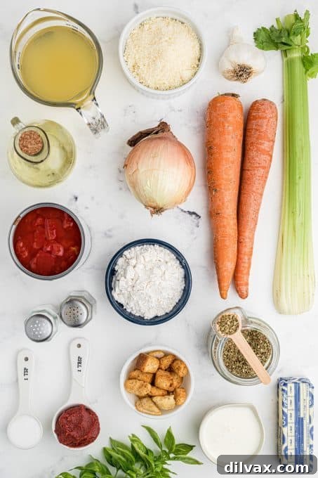 Effortless Instant Pot Tomato Basil Bliss 4 Fresh ingredients for Creamy Instant Pot Tomato Soup laid out on a table