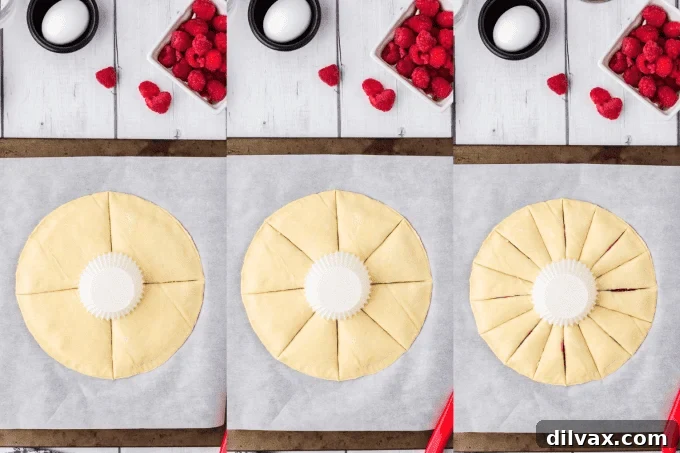 Swirling Raspberry Star Bread 6 A layered puff pastry with raspberry filling, showing radial cuts made to form the star bread design.
