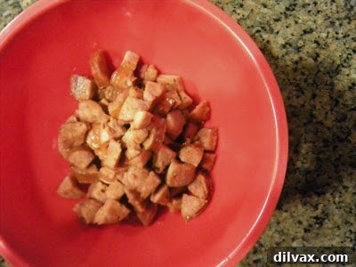 Sautéing garlic and onion in a skillet.