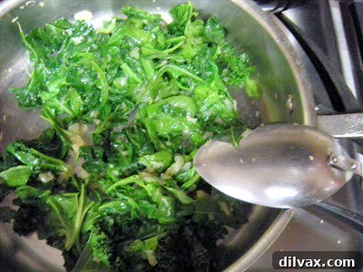 Adding browned sausage back to the pan with greens.