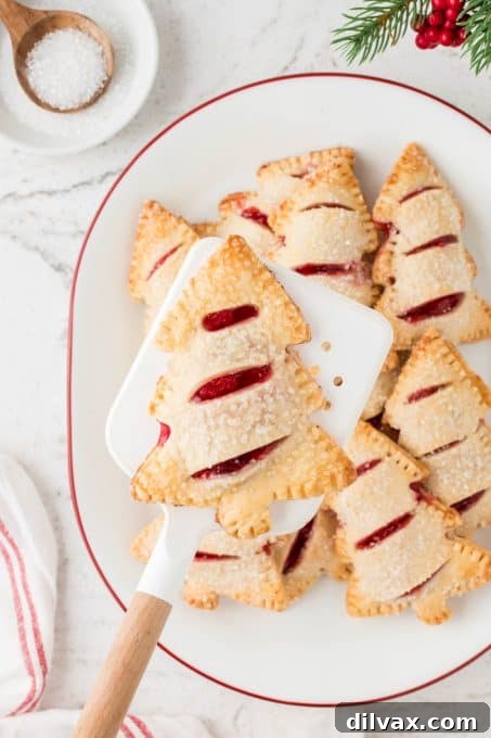 A freshly baked Christmas Cherry Hand Pie, golden and inviting, cooling on a wire rack.