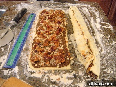 A delightful array of ingredients for Rugelach filling, including various dried fruits and chopped nuts.