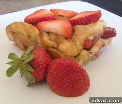 Close-up of baked strawberry cream cheese waffles with a golden topping.