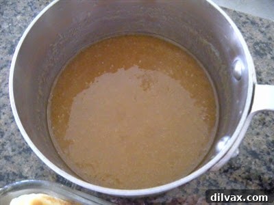 Oven-Kissed Strawberry Waffles 6 Close-up of a serving of baked strawberry waffles with cream cheese.