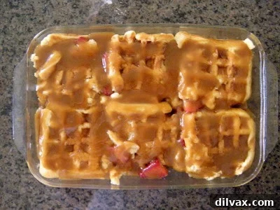 Another angle of the golden-brown baked strawberry waffles.