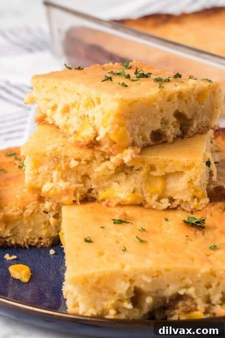 Close-up of a warm slice of Corn Spoon Bread