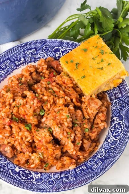 Bayou Bliss 10 Jambalaya Recipe with a rustic wooden background.
