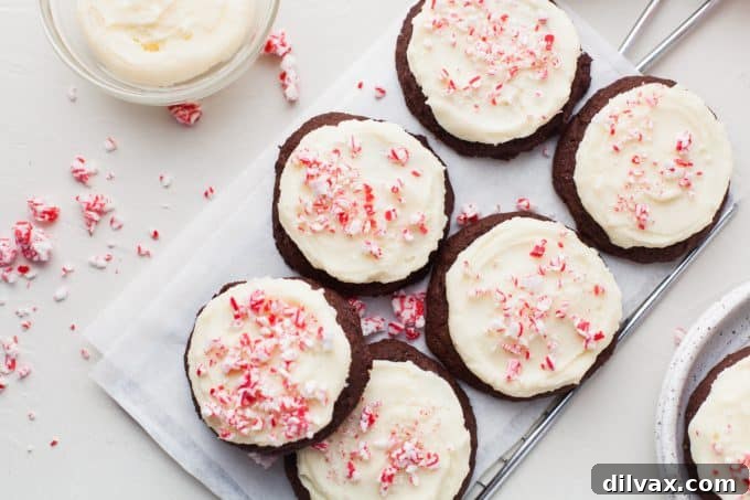 Peppermint frosting on chocolate cookies.