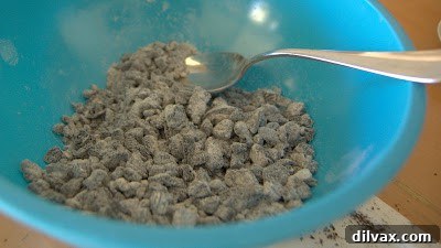 Day 358: The Final Week Begins, Sweetened by Oreo Cupcakes 7 A close-up of chopped Oreos coated lightly with flour.