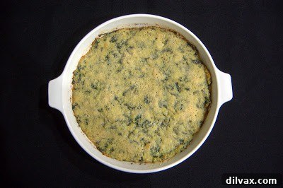 Delicious Baked Spinach and Gruyère Quinoa fresh out of the oven, golden and bubbling.
