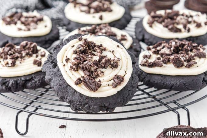 Copycat Frosted Oreo Cookies from Crumbl – large, dark chocolate cookies with creamy white frosting.