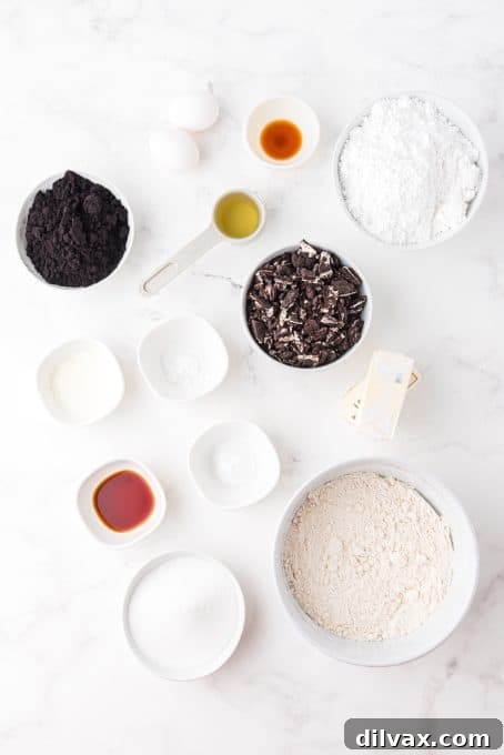 Ingredients for making Frosted Oreo Cookies, laid out on a surface.