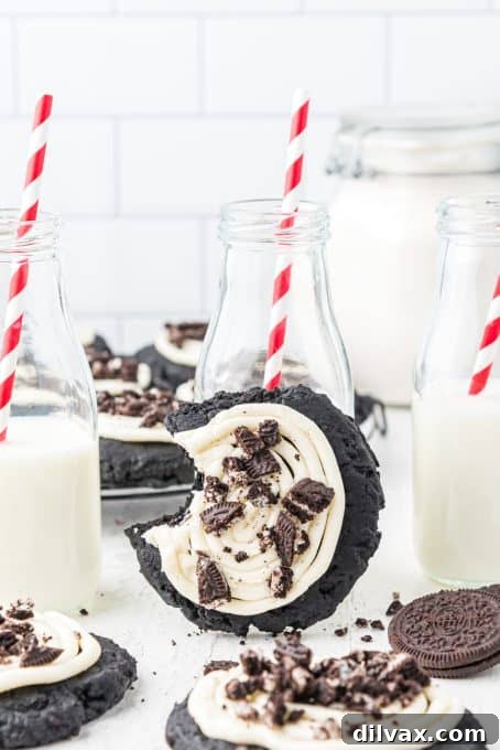 A copycat Crumbl Oreo cookie with creamy frosting and crushed Oreos.