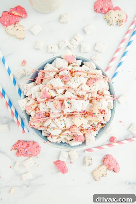 Carnival Critter Chow 7 Circus Animal Cookie snack made with Chex cereal, drizzled with pink.