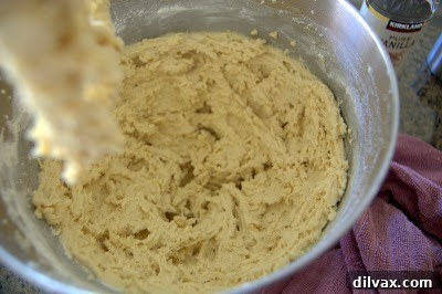Irresistible Reese's Peanut Butter Cup Cookies 4 Unlined cookie sheet with browned cookies, demonstrating the importance of parchment paper.