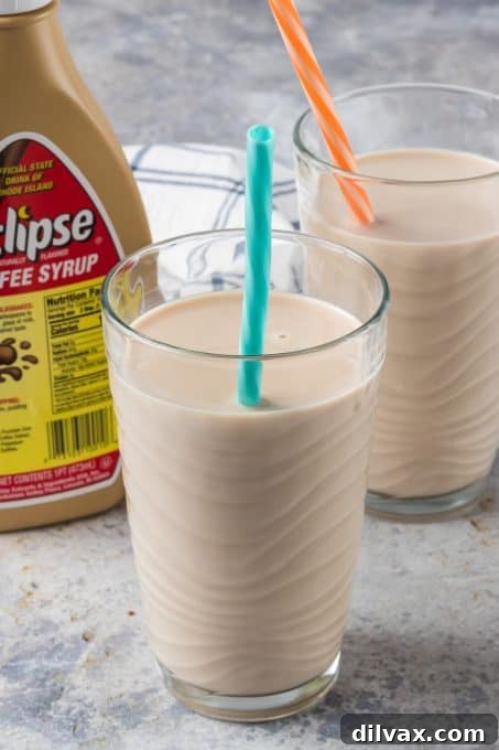 Coffee milk, the official state drink of Rhode Island, with coffee syrup bottle