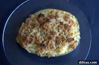 Freshly baked twice-baked acorn squash, golden brown and hot from the oven.