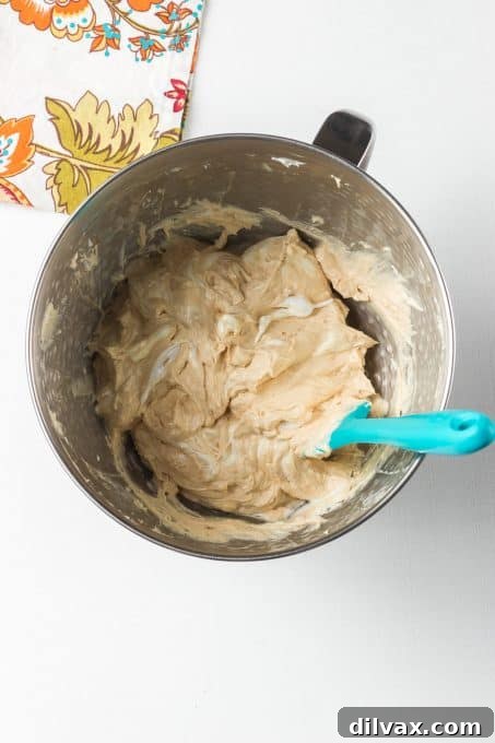 Making a peanut butter dessert dip.