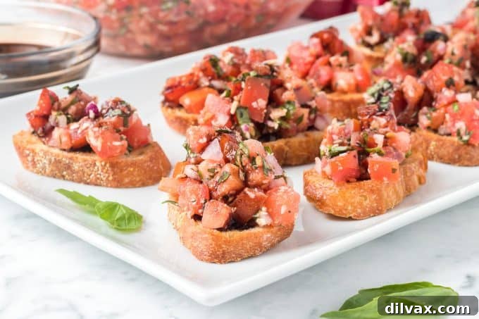 Effortless Fresh Tomato Bruschetta 2 Classic Italian Bruschetta with fresh tomatoes, basil, and balsamic glaze.