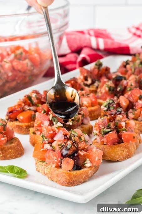 Drizzling a balsamic glaze on bruschetta.