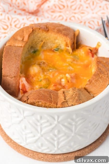 A perfectly baked egg in toast cup, ready to be enjoyed.