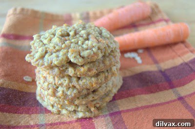 Delicious homemade Oatmeal Carrot Cookies cooling on a rack, ready to be enjoyed.