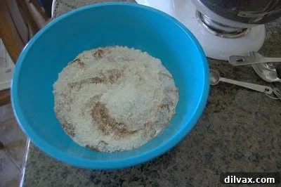 Mixing dry ingredients in a bowl.