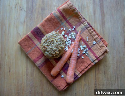 Freshly baked Oatmeal Carrot Cookies cooling on a wire rack.