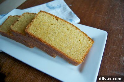 Butterscotch Pound Cake 10 Side view of a perfectly baked Brown Sugar Pound Cake, showcasing its golden crust and moist interior.