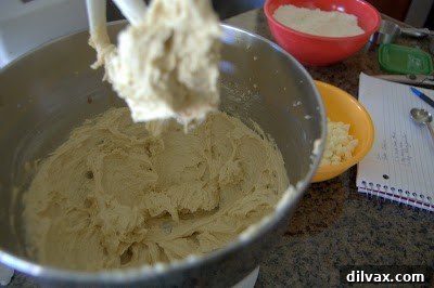 White Chocolate Cake Batter Bliss Bites 4 Mixing bowl with creamed butter, sugar, eggs, and vanilla, being blended to a smooth consistency.