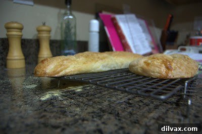 Final image of the baked French bread loaves, presenting their honest, rustic appearance.