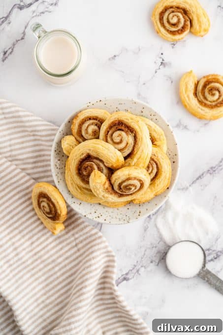 A plate of Cinnamon Swirls made of puff pastry.
