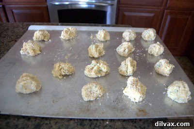 Forming mashed potato mixture into small balls or patties before coating.
