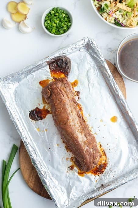 Sticky Asian Glazed Pork Tenderloin 6 Roasted Pork Tenderloin, whole and freshly removed from the oven