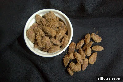 Baked sweetly spiced almonds cooling on a wire rack