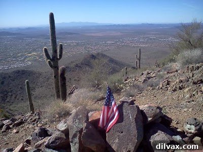 Mountain peak view showing distant hills and clear sky