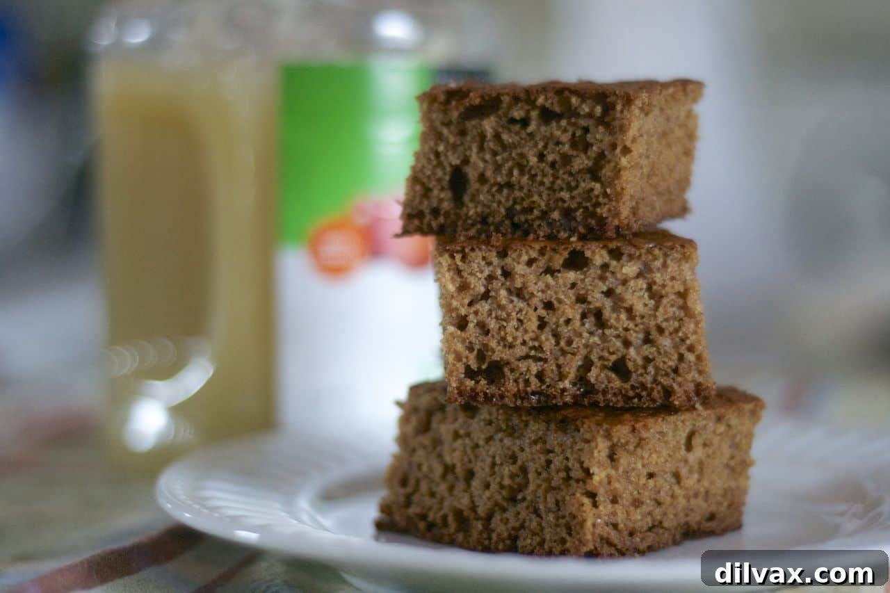 A full Applesauce Cake, ready to be sliced and served.