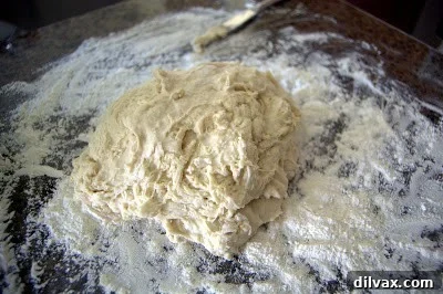 Kneading dough on a floured surface