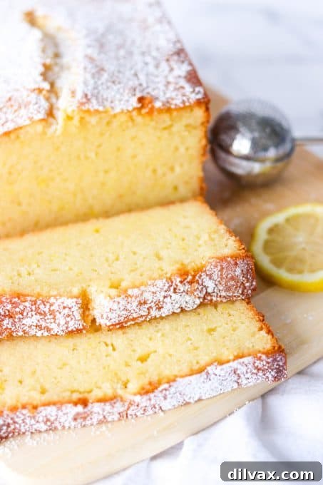 Close-up of golden-brown slices of Lemon Ricotta Pound Cake, showcasing its dense and moist texture.