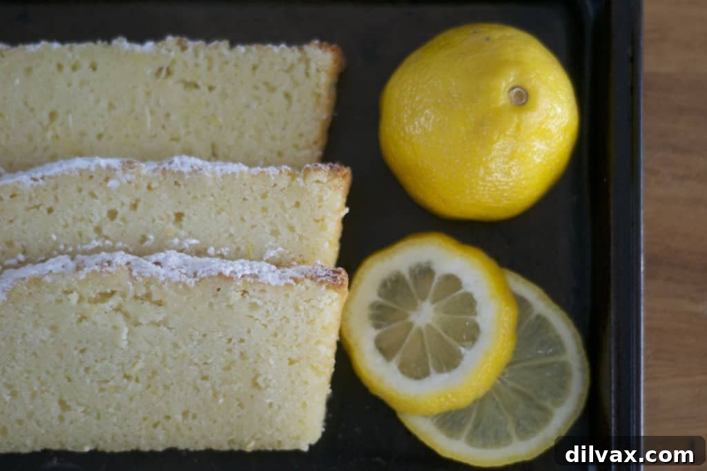 An inviting top-down view of a cooling Lemon Ricotta Pound Cake, showcasing its perfect golden crust and inviting texture.